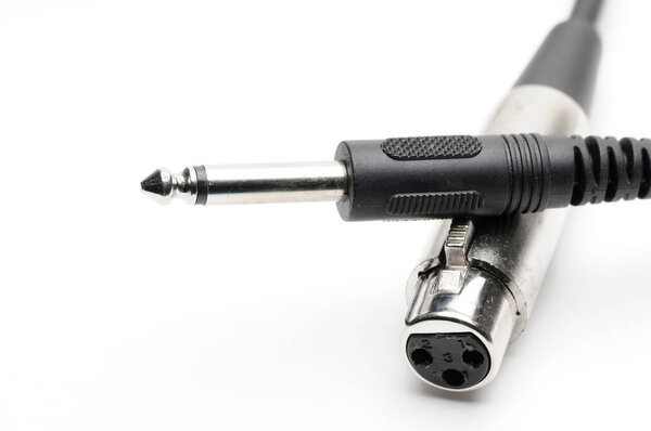 Audio cable with XLR and TRS jack connectors for microphones and professional audio equipment on an isolated white background