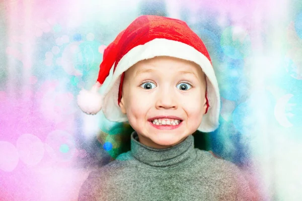 Radostné chlapeček v Santa klobouky — Stock fotografie
