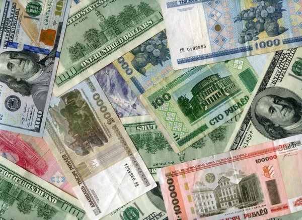 Background. US dollars and Belarus rubles — Stock Photo, Image