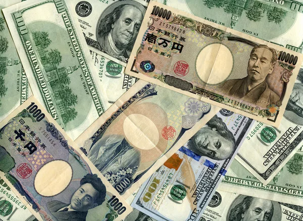 Background. Dollars and yens — Stock Photo, Image