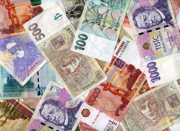 Background. Russian rubles and Czech koruns — Stock Photo, Image