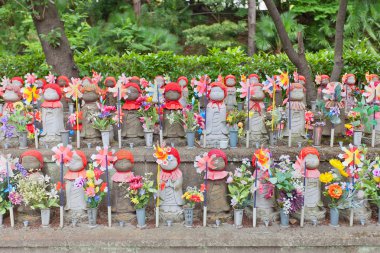 Jizo statues in Zojo-ji Temple, Tokyo, Japan