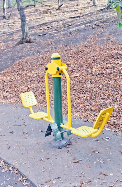 Yellow exercise machine in Vysehrad of Prague — Stock Photo, Image