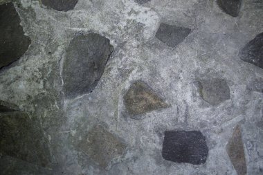 Taşlı gri çimento dokusu.
