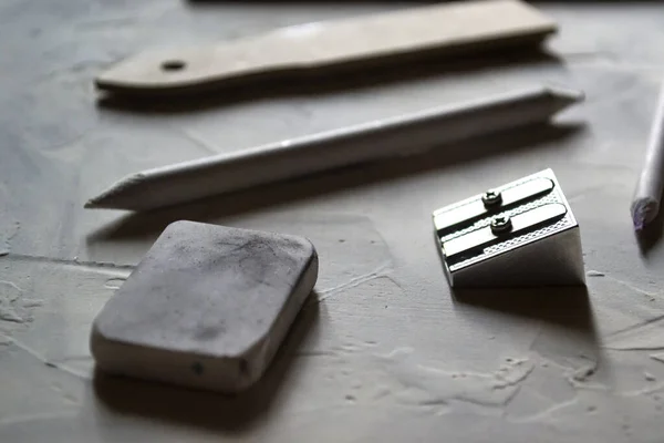 A set of artist\'s tools, for drawing.