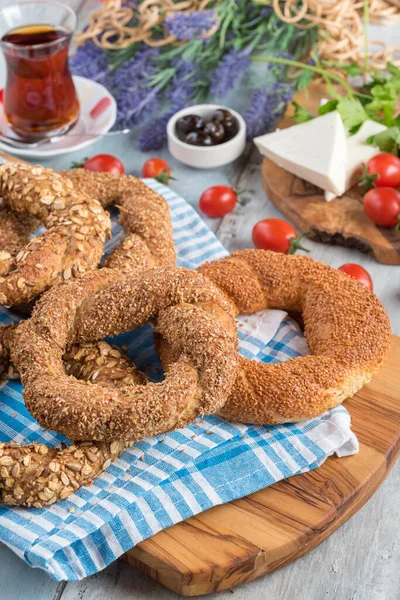 different types of Turkish bagels served with foods for breakfast and Turkish tea