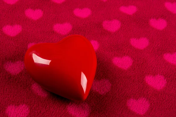 Red valentines day heart on heart shaped background — Stock Photo, Image