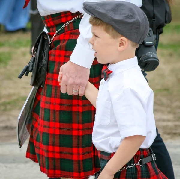 Far och son i jacksonville florida highland games — Stockfoto