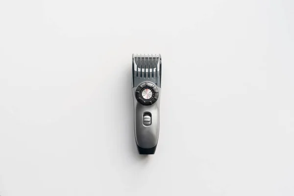 Simple single abstract hair clipper isolated on the color background, barbershop accessory — Stock Photo, Image