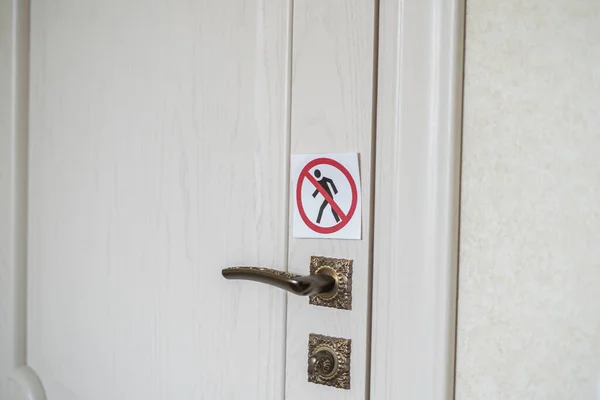 A prohibited to pass, no go zone area symbol sticker on the door — Stock Photo, Image