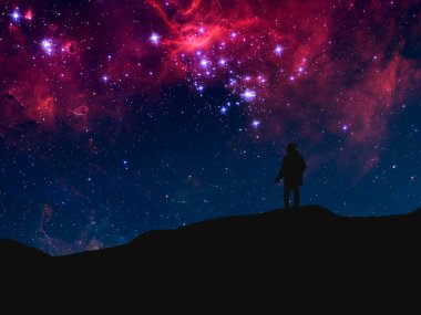 Dağın tepesinde duran ve gökyüzü galaksisini izleyen bir kişinin silüeti. Bu görüntünün unsurları Nasa tarafından desteklenmektedir