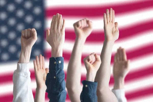 the people vote with raised hands in usa country
