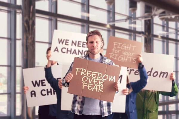 The people outside in the streets with banners on the protest march, politics event — Stock Photo, Image