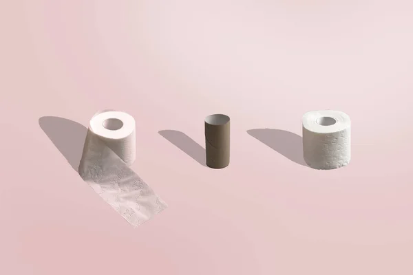 A creative idea with toilet paper on pastel trendy background — Stockfoto