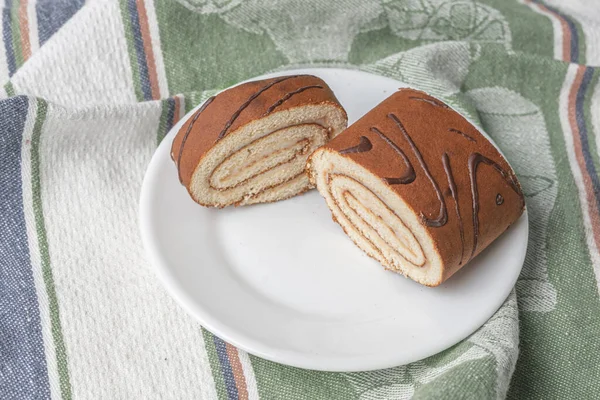 A delicious slice of sweet dessert roll cake, traditional homemade food — 스톡 사진