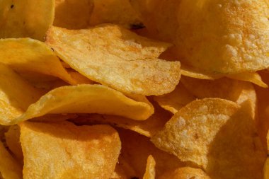 Sarı patates cipsi arkaplan kalıbının makro görüntüsü