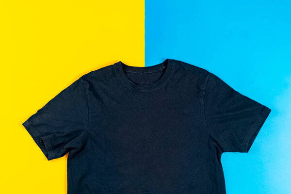 a simple t-shirt top isolated, minimalistic concept with copy space mockup, a view from above