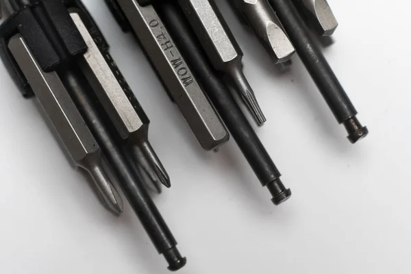 A macro view of set of silver screwdriver bits collection — Fotografia de Stock