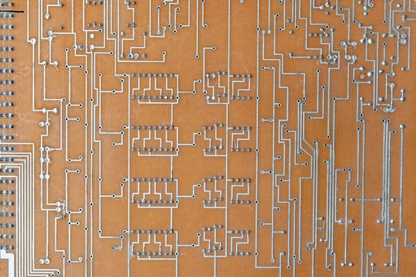 Closeup photo of computer circuit board background texture abstract — Stock Photo, Image