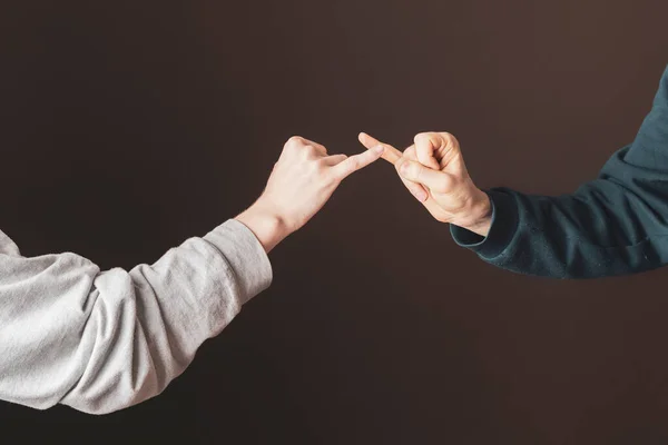 Two men hold their little fingers and make peace d s — Stock Photo, Image