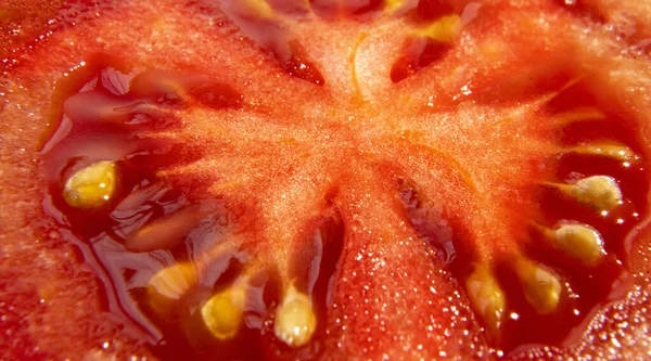 Foto macro de corte vermelho fresco textura de tomate e — Fotografia de Stock