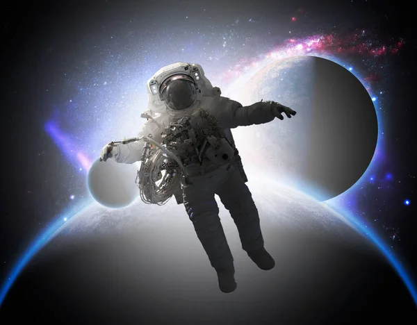 Astronaut walking in outer space, elements of this image furnished by nasa b — Stock Photo, Image