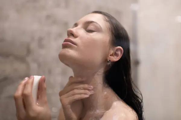 Young Female Soft Touching Neck Closed Eyes While Taking Shower — Stock Photo, Image