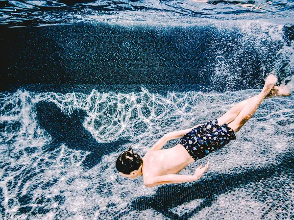 Years Old Boy Swimming Shadow Dolphin Pool — Stock Photo, Image