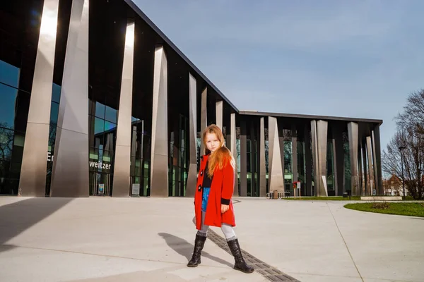 Cute Little Girl Posing Sun Red Coat Springtime — Fotografia de Stock