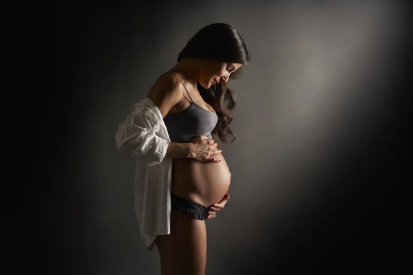 Young Pregnant Dancer Posing Holding Her Belly Her Hands Underwear — Stockfoto