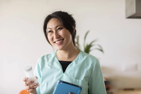 Young Asian Nurse Use Tablet Hospital — Foto Stock
