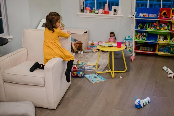 Little Girl Sitting Beige Armchair Room Toys — Stock Photo, Image