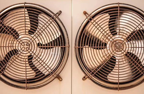 Metal refrigerator fan forming part of an industrial refrigerator