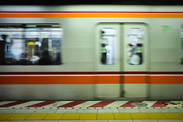 Subway train leaving from a station in Tokyo, Japan