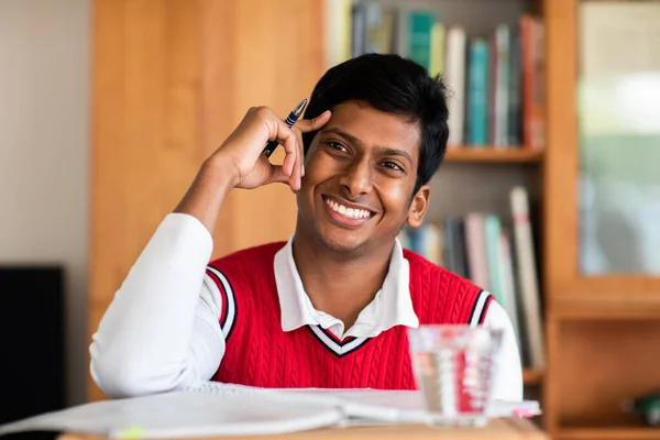 Handsome Indian Student Studying University Bookshelf Background — 图库照片