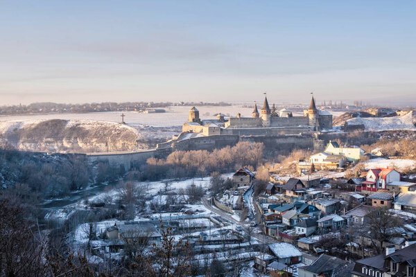 Kamianets-Podilskyi, Ukraine 01.07.2020. Panoramic view of the Kamianets-Podilskyi fortress in the early sunny winter morning