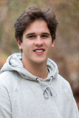 Head and shoulders portrait of caucasian male college student