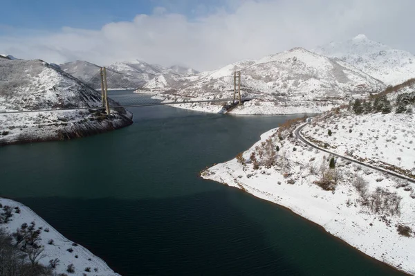 water reservoir snowed from aerial view