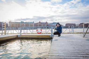 Cold Water Swimmer Bundled Up Looking At Ice Beautiful Morning Denmark
