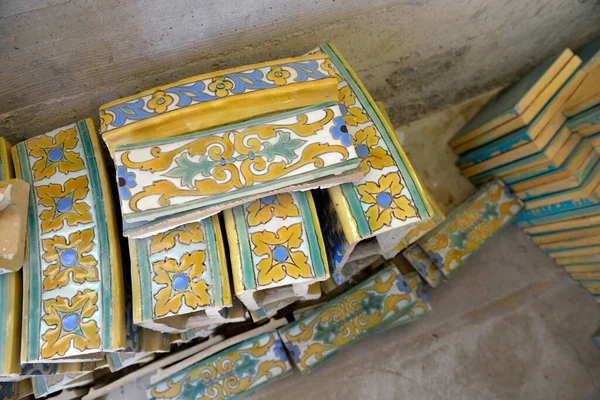 Glazed tile stored in the basement of Scotty\'s Castle,  Death Valley, California