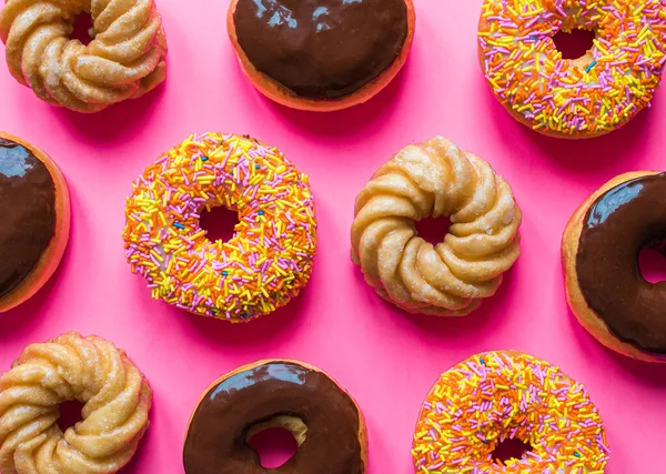 Overhead Assorted Donuts Bright Pink Background — Stock Photo, Image