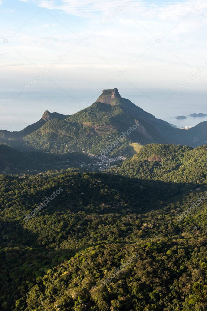 Beautiful view to green rainforest mountains from Pico da Tijuca in Tijuca Park, Rio de Janeiro, Brazil