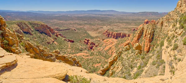 Western view of Sedona Arizona from the saddle section of Bear Mountain just past the 1st Peak. The true peak is on the upper right.