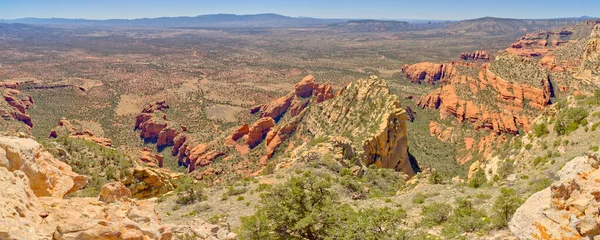 Western view of Sedona Arizona from the summit of Bear Mountain.