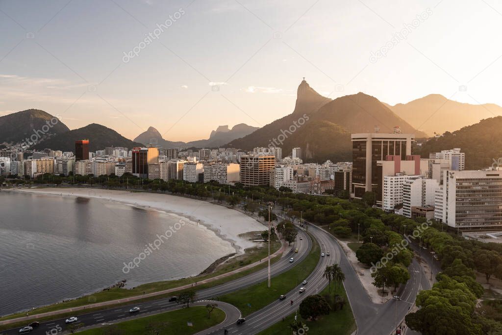 Beautiful sunset view to city, Corcovado Mountain and Christ Statue, Rio de Janeiro, Brazil