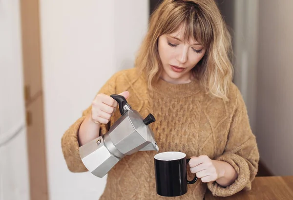 Young Woman Pours Coffee Moka Pot Black Cup —  Fotos de Stock