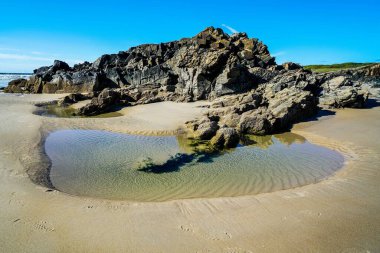 Tramore plajı İrlanda sahilinde büyük bir plajdır..