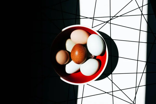 Overhead View Eggs Red Bowl Modern Background — Stock Photo, Image