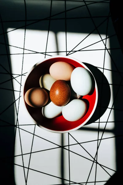 Overhead View Brightly Colored Eggs Red Bowl — Stock Photo, Image