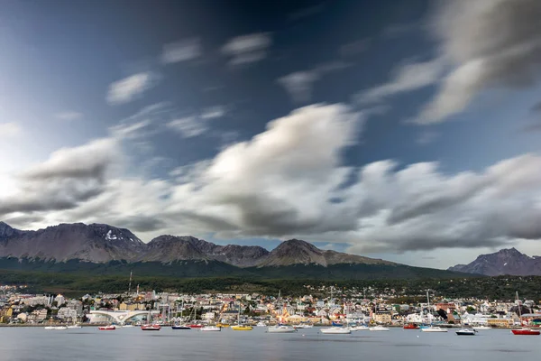 Stormy clouds flows quickly over Usuahia city on a cold February afternoon.Usuahia, Tierra del Fuego, Argentina